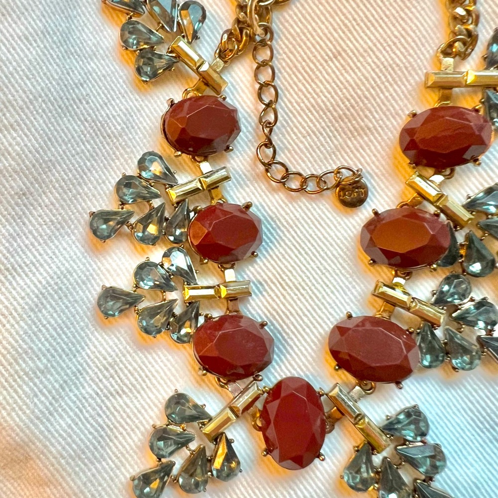 Loft , fancy and stylish necklace blue , red wine color with gold chain . Medium